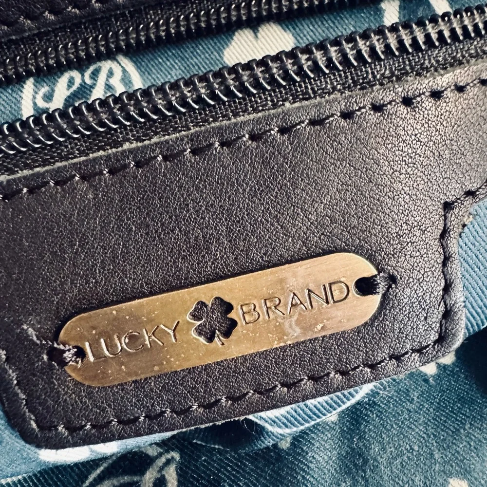 Lucky Brand Abbey fold over black leather studded messenger bag.Very Clean.